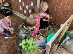 Kids Outside Planting